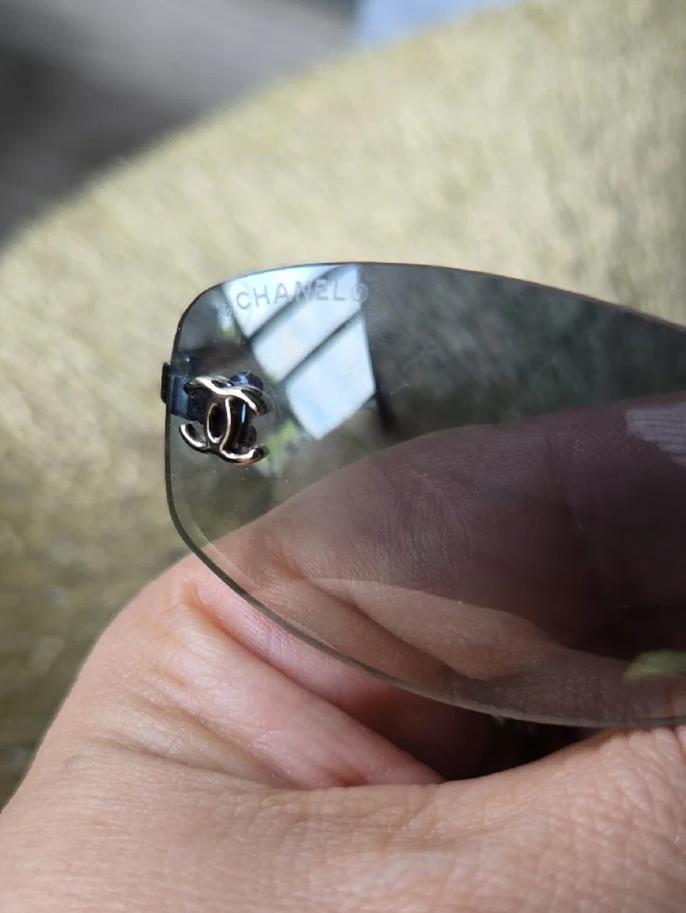 Chanel 4002 Rimless CC Aviator Sunglasses in Smoke Gray.